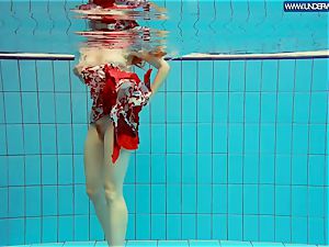 red-hot polish red-haired swimming in the pool